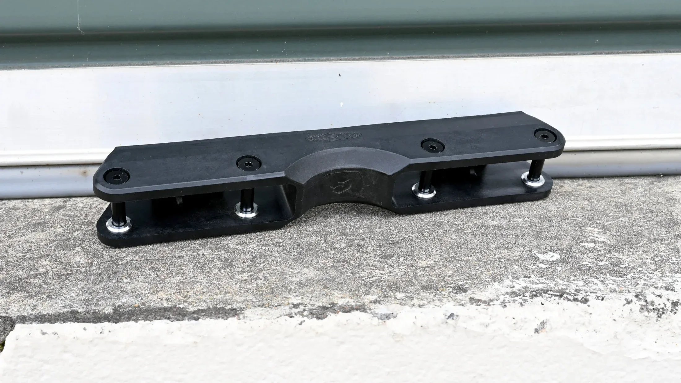 Black Standard Antirocker Frame on a concrete ledge